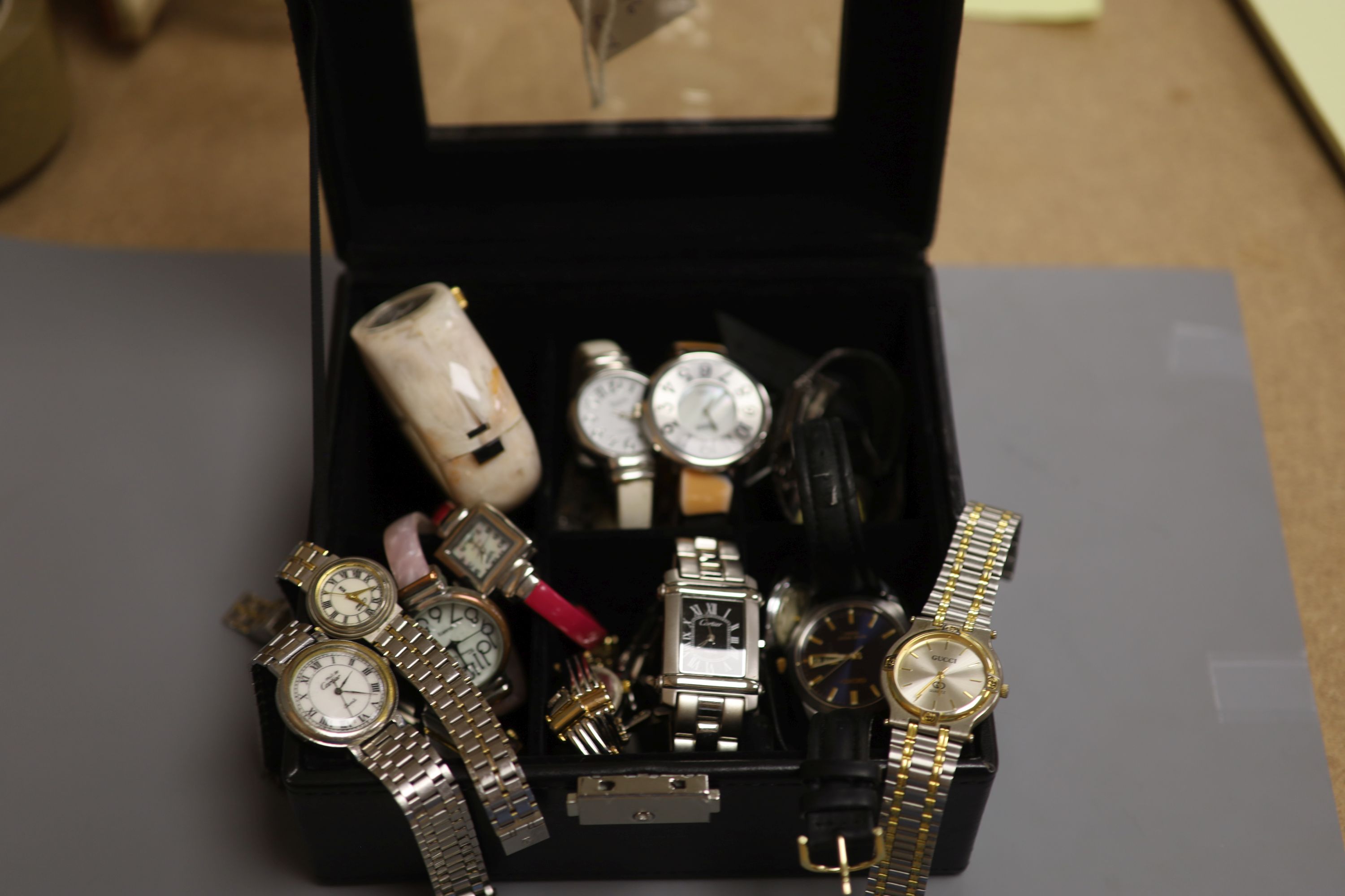 A collection of lady's and gentlemen's quartz and other wristwatches including Seiko.